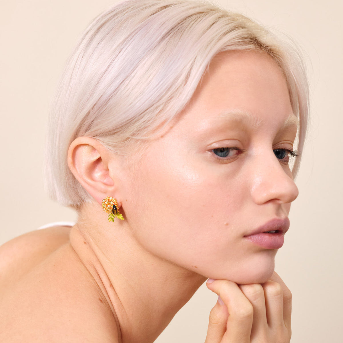 Post Earrings FLEURS DE POETES — worn by a model