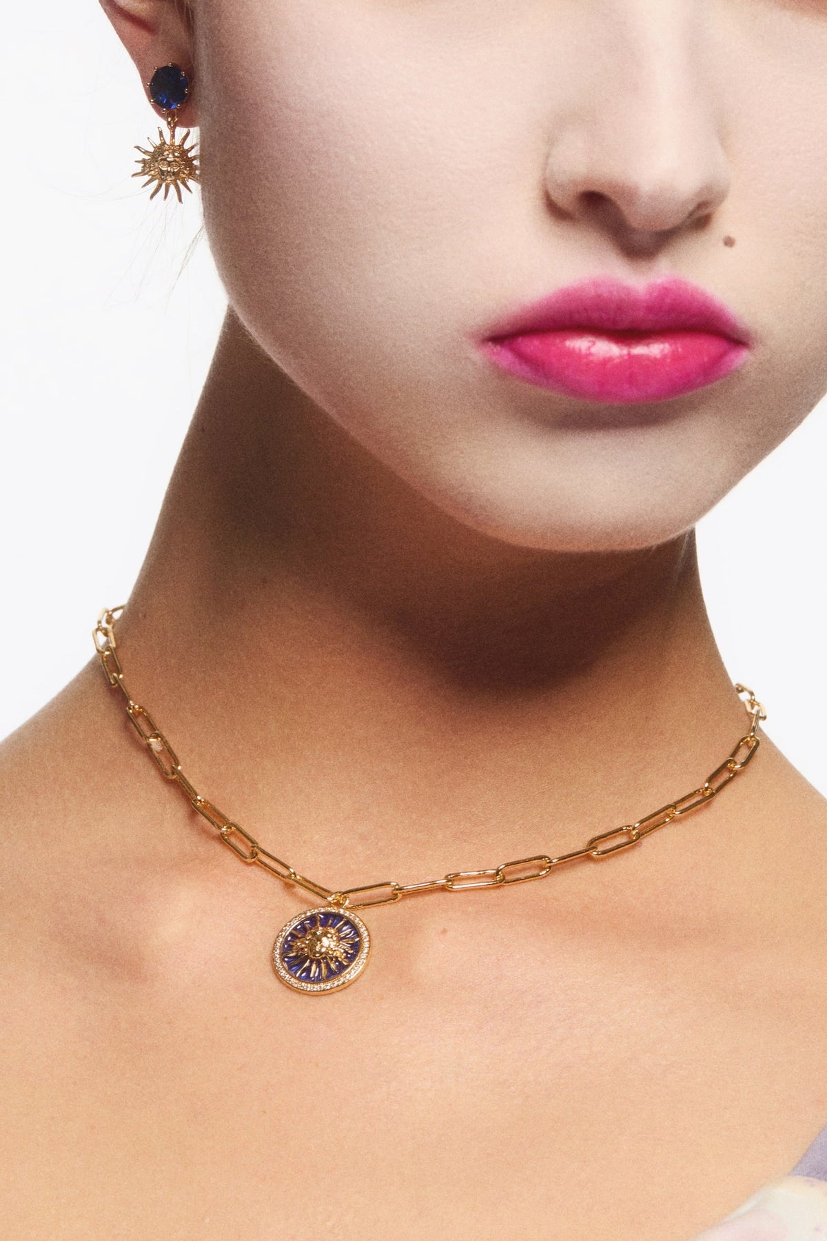 Post Earrings PETIT TRIANON — worn by a model
