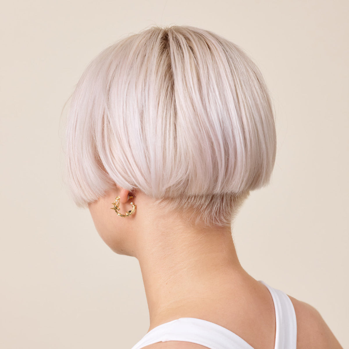 Post Earrings NATURE FLAMBOYANTE — worn by a model