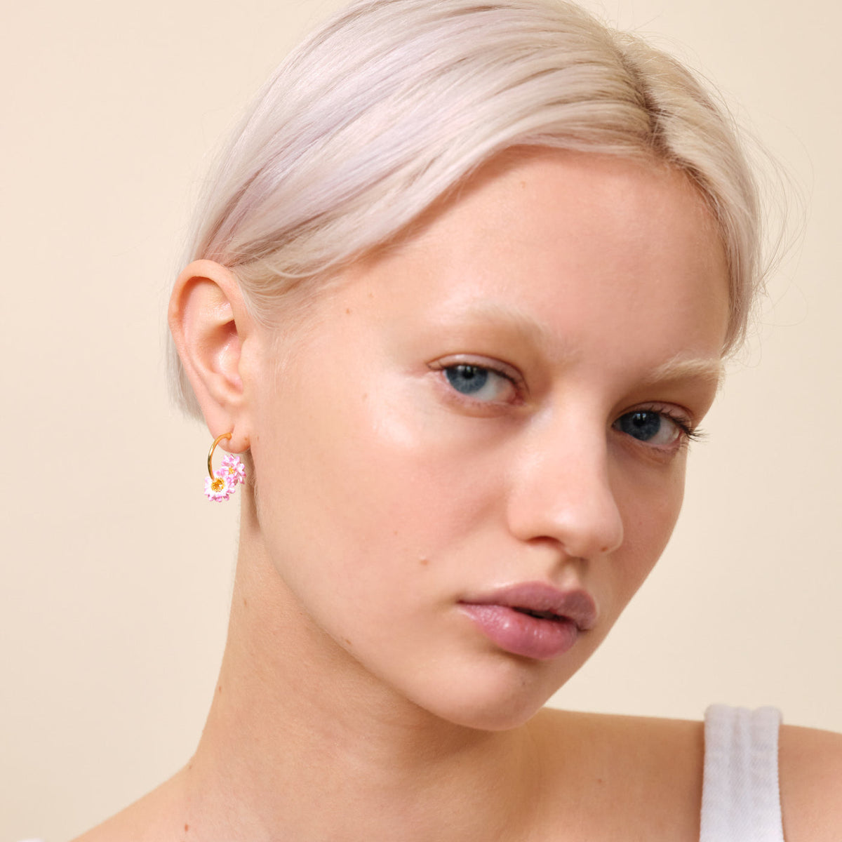 Post Earrings FLEURS DE POETES — worn by a model