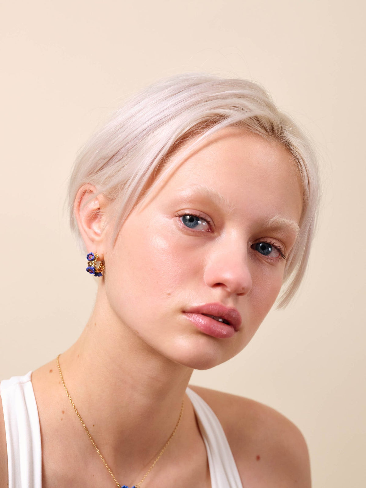 Post Earrings FLEURS IMAGINAIRES — worn by a model