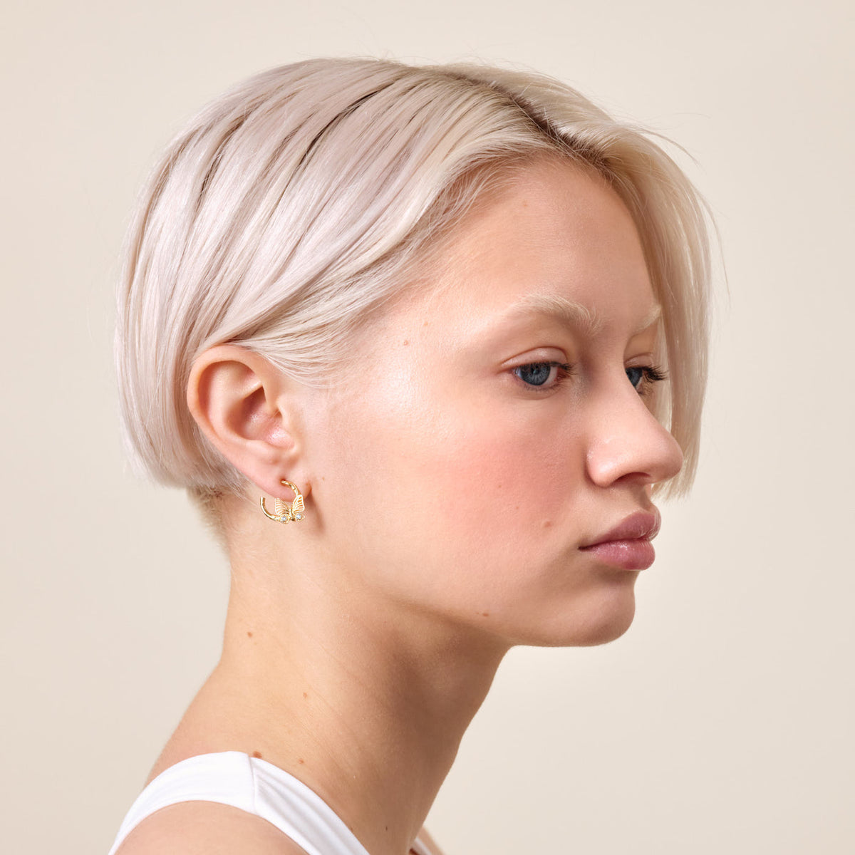 Post Earrings NATURE FLAMBOYANTE — worn by a model