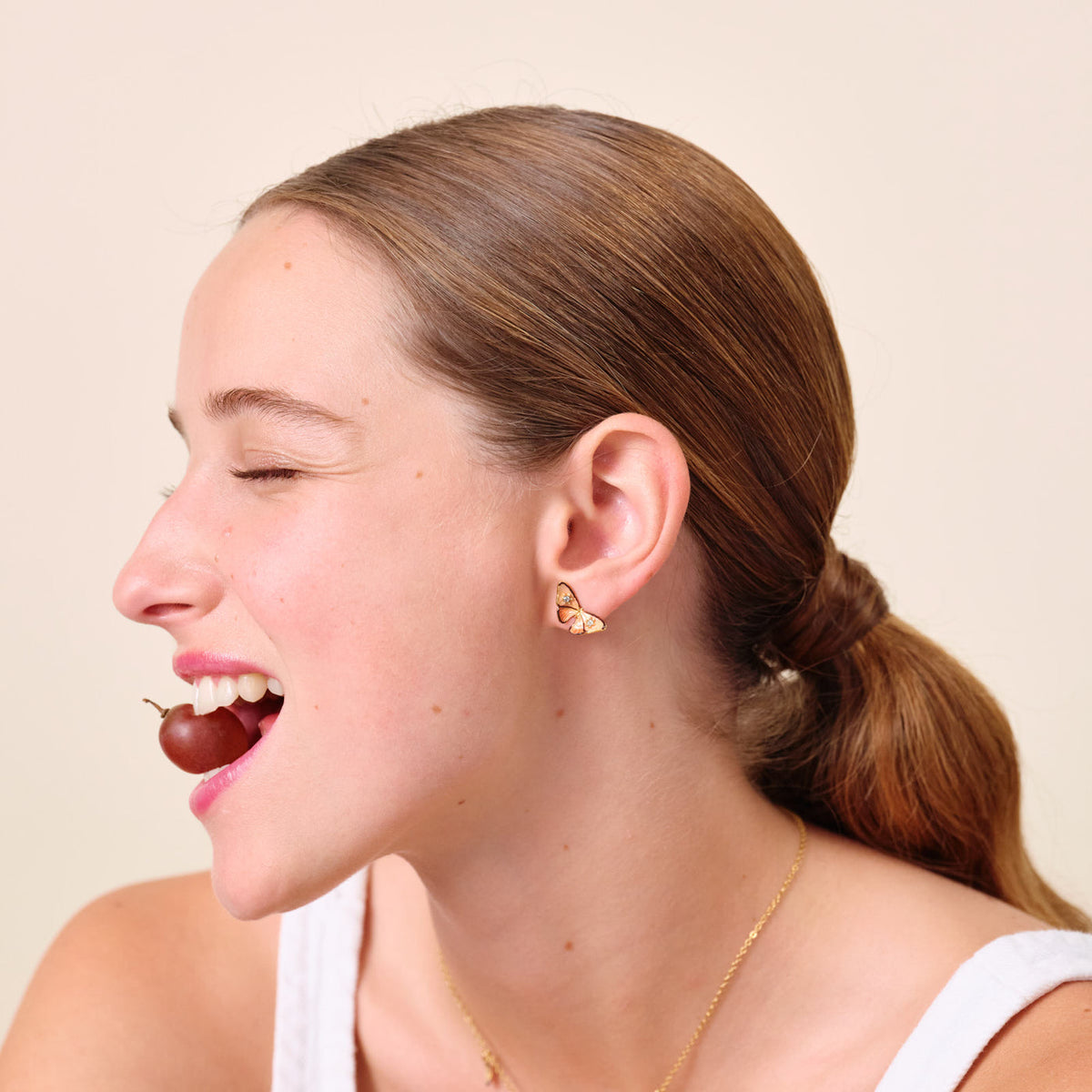 Post Earrings LES NÉRÉIDES LOVES ANIMALS — worn by a model